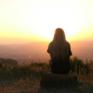 pexels photo 247195 woman looking at sunset
