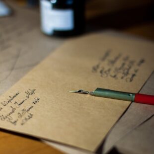 pexels photo 281962 brown envelop on table