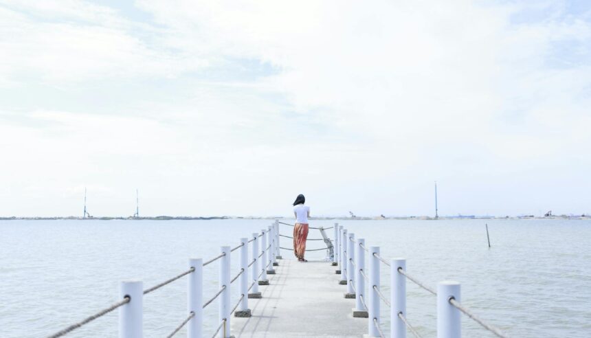 pexels photo 460211 woman standing on dock